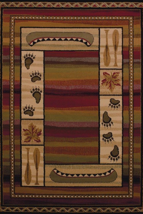 Picture of an area rug that has canoes, bear paw prints, paddles, and leaves on it